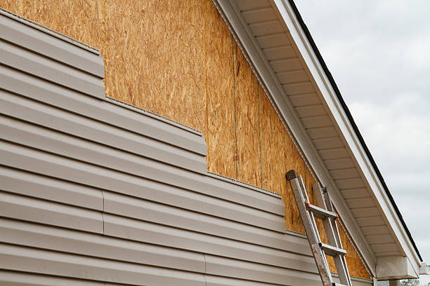 Professional Siding Installation technician working in Sadsburyville, PA